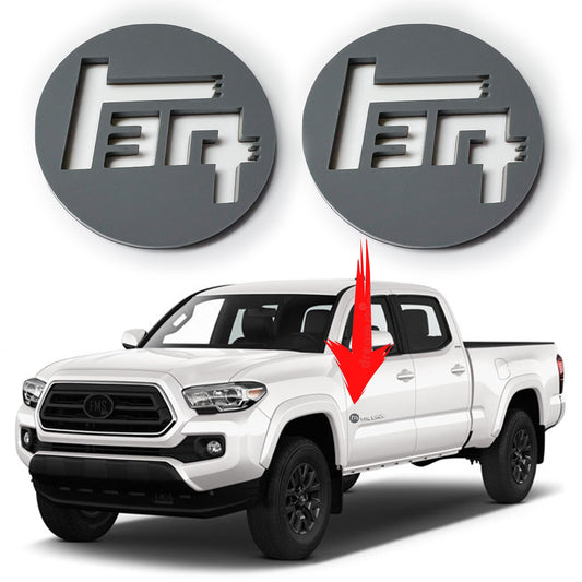 FMSgear custom Toyota TEQ emblem set shown on white Toyota pickup truck door with two gray emblem pieces